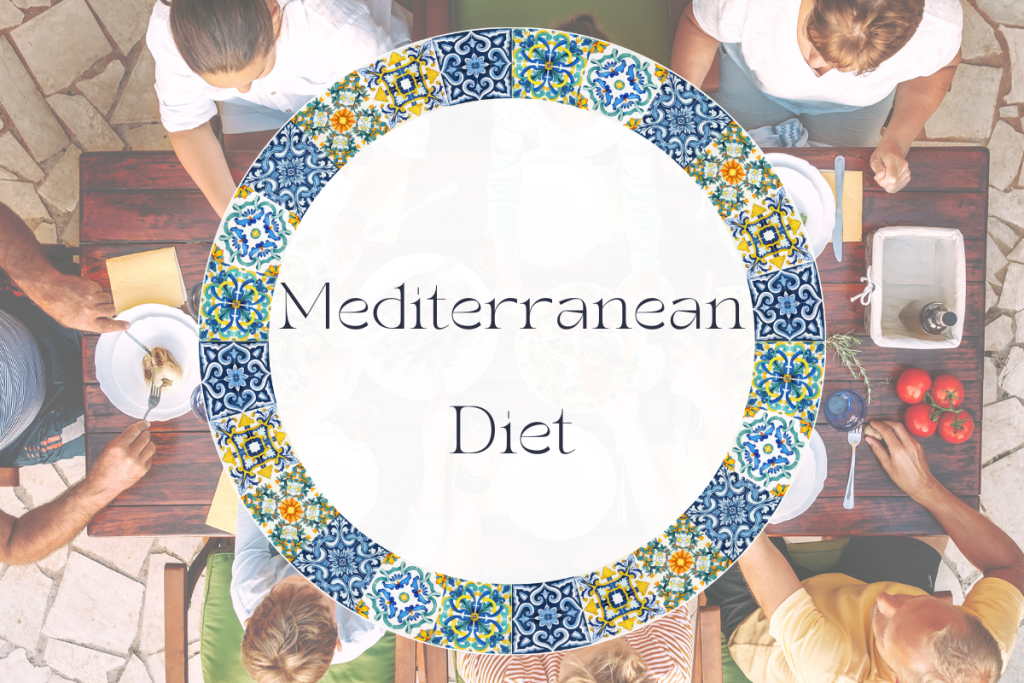 Above view of a family sharing a meal at a dinner table with the words "mediterranean diet" over it. 