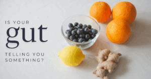Image of fruits on a table with the text "is your gut telling you something?"