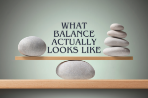 Balance scale with rocks on both ends, and the text "what balance actually looks like".