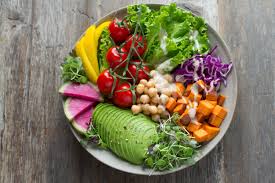 A bowl full of colorful, healthy and nourishing foods. 